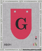 A taped needlepoint canvas with the design: Banner 18 mesh count Rounded G Black on Red.