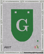 A taped needlepoint canvas with the design: Banner 18 mesh count Rounded G White on Green.