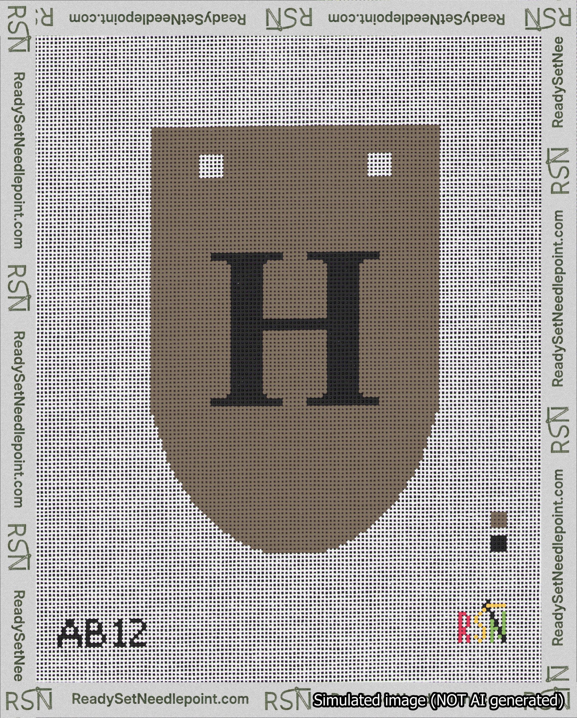 A taped needlepoint canvas with the design: Banner 18 mesh count Rounded H Black on Brown.