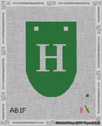 A taped needlepoint canvas with the design: Banner 18 mesh count Rounded H White on Green.