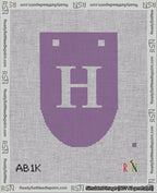 A taped needlepoint canvas with the design: Banner 18 mesh count Rounded H White on Purple.