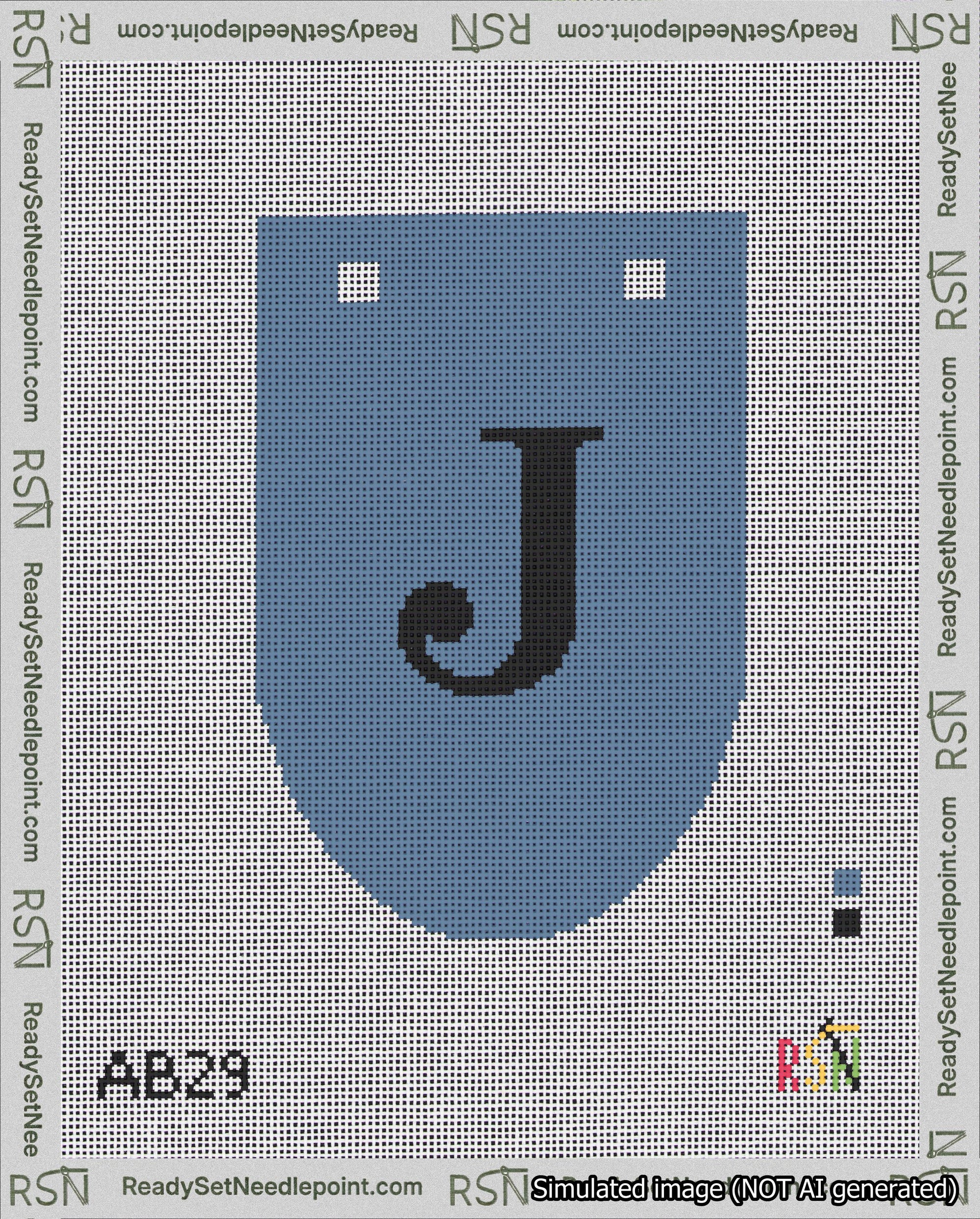 A taped needlepoint canvas with the design: Banner 18 mesh count Rounded J Black on Blue.