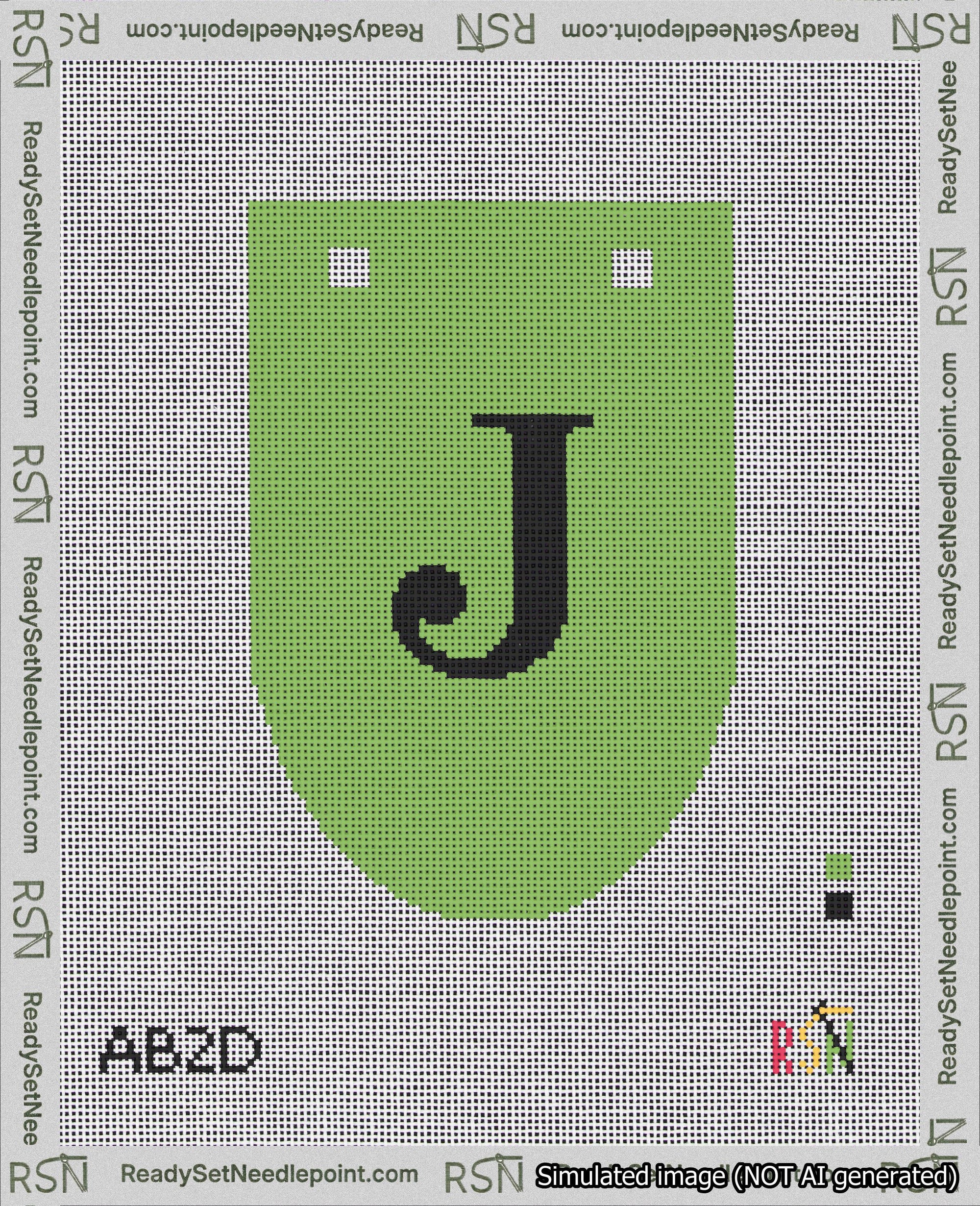 A taped needlepoint canvas with the design: Banner 18 mesh count Rounded J Black on Light Green.