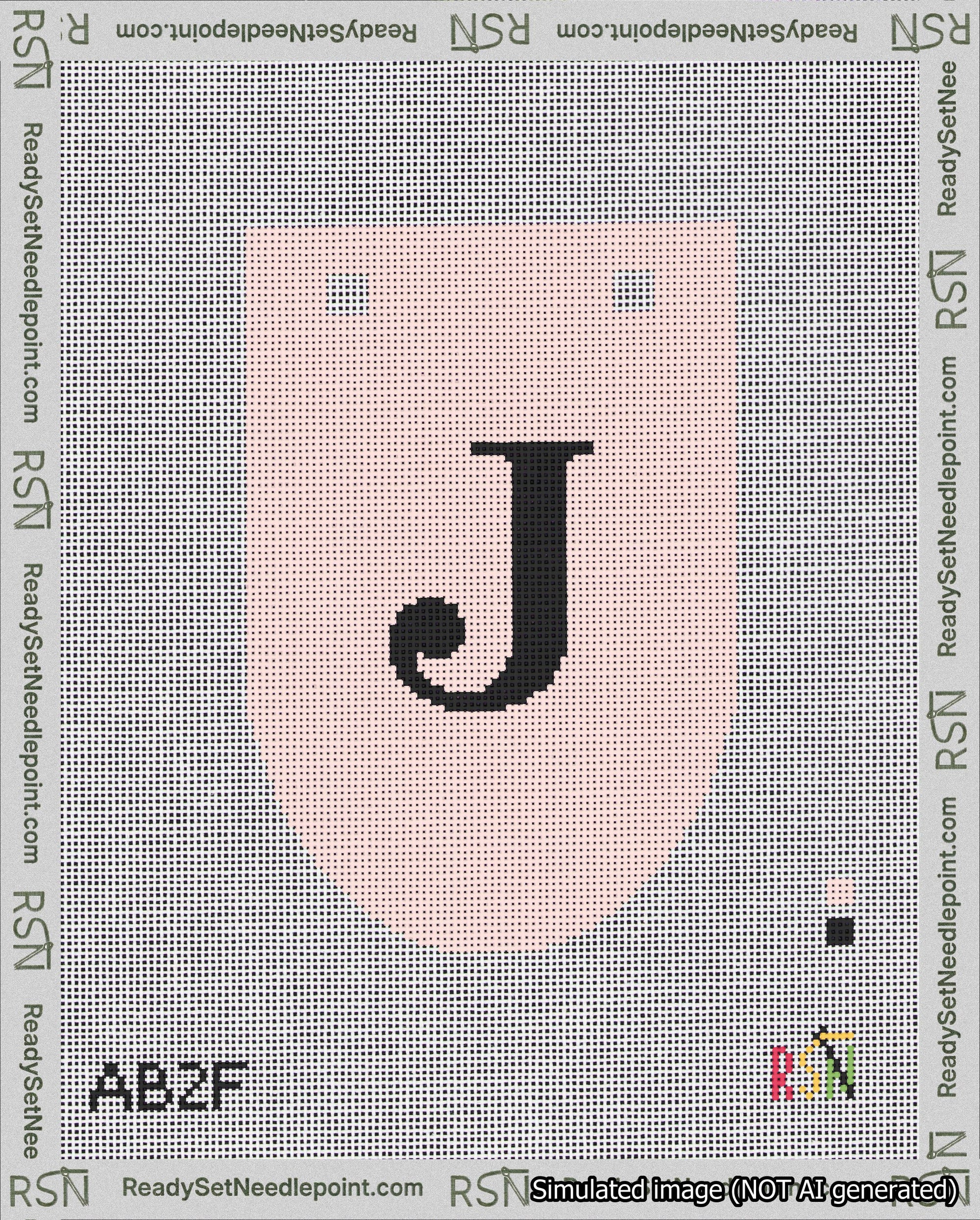 A taped needlepoint canvas with the design: Banner 18 mesh count Rounded J Black on Pink.