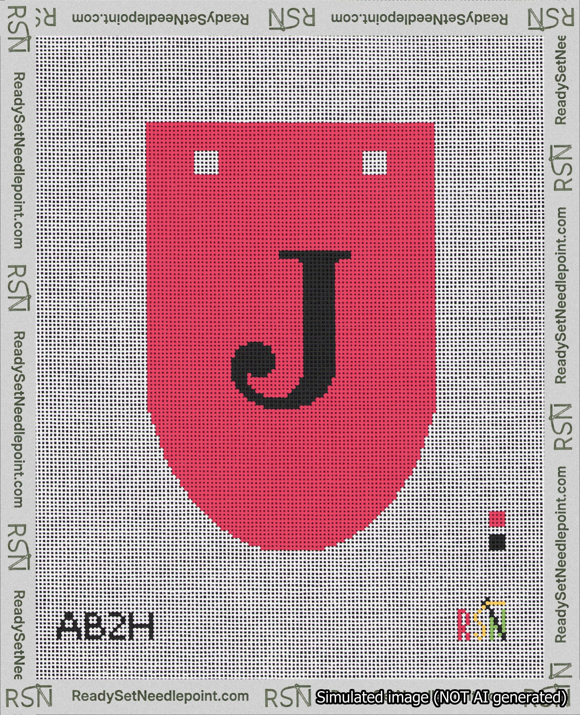 A taped needlepoint canvas with the design: Banner 18 mesh count Rounded J Black on Red.