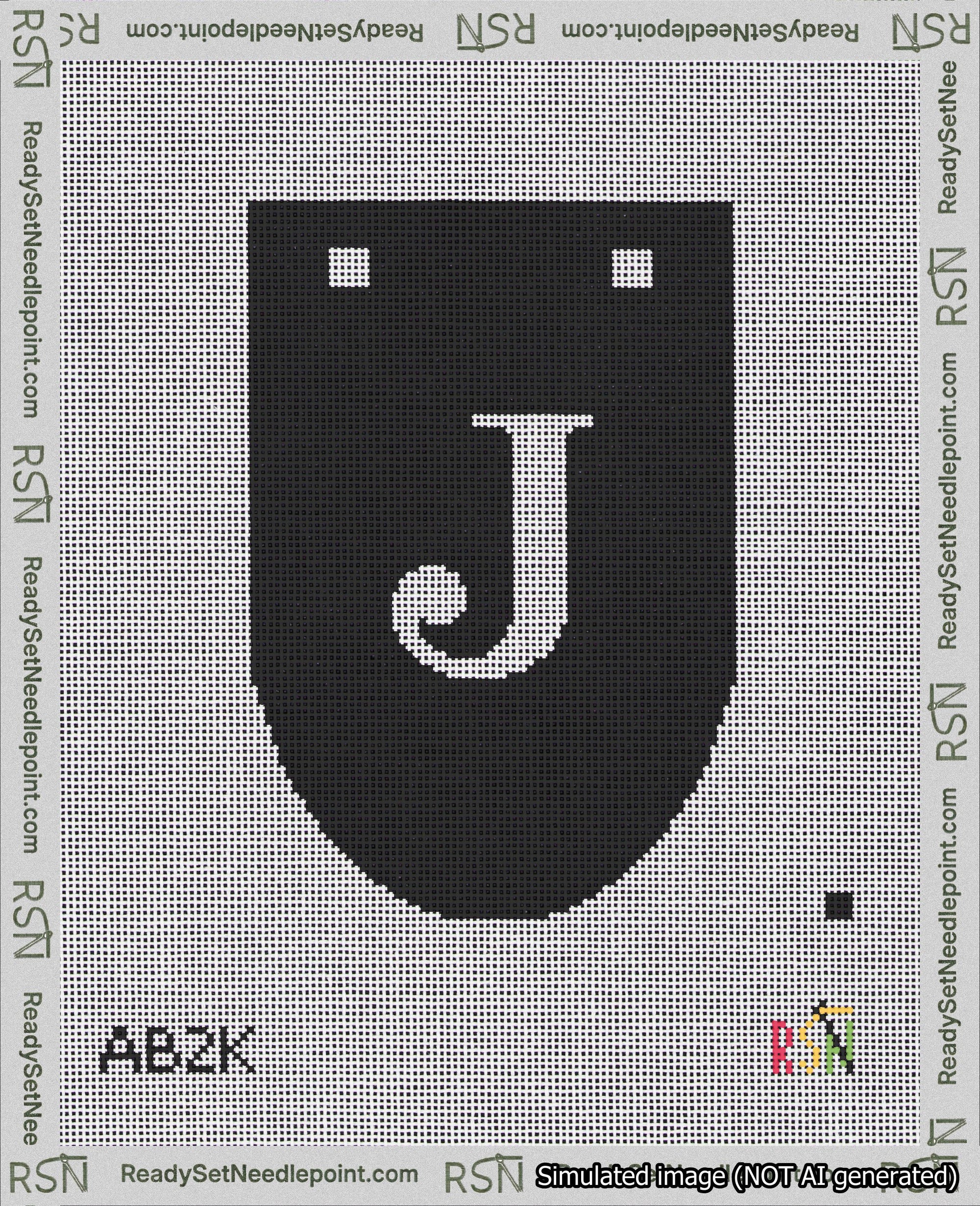A taped needlepoint canvas with the design: Banner 18 mesh count Rounded J White on Black.
