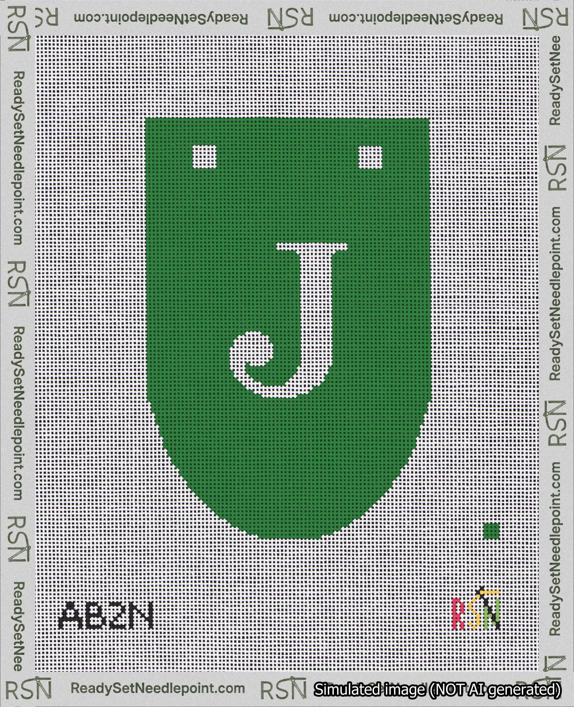A taped needlepoint canvas with the design: Banner 18 mesh count Rounded J White on Green.