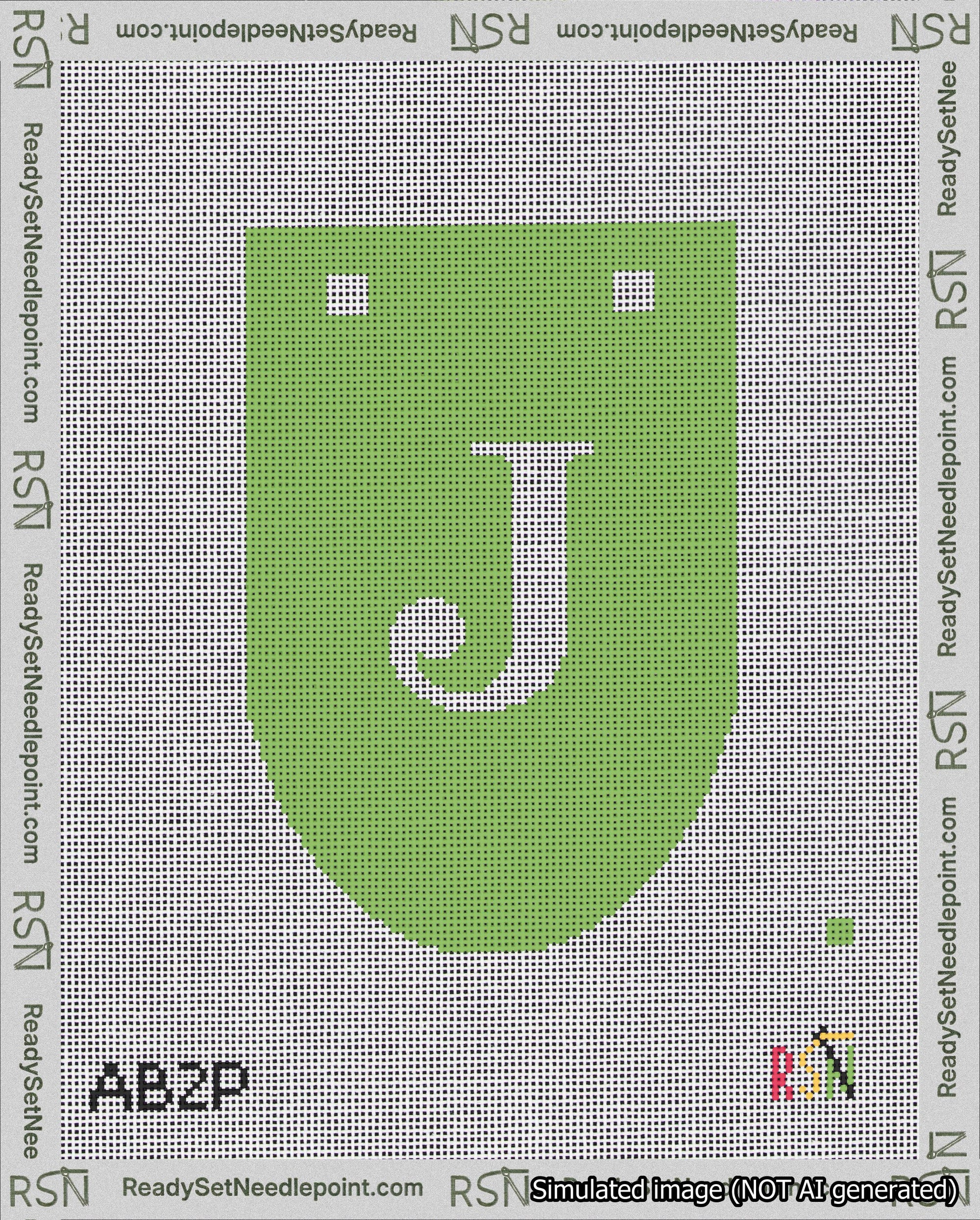 A taped needlepoint canvas with the design: Banner 18 mesh count Rounded J White on Light Green.