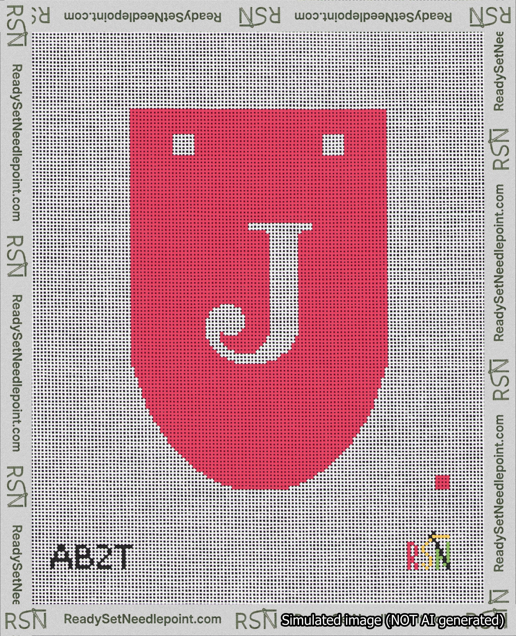 A taped needlepoint canvas with the design: Banner 18 mesh count Rounded J White on Red.