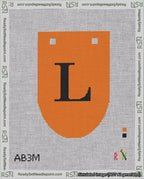 A taped needlepoint canvas with the design: Banner 18 mesh count Rounded L Black on Orange.