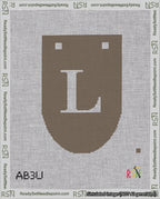 A taped needlepoint canvas with the design: Banner 18 mesh count Rounded L White on Brown.
