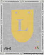 A taped needlepoint canvas with the design: Banner 18 mesh count Rounded L White on Yellow.