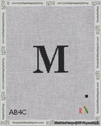 A taped needlepoint canvas with the design: Banner 18 mesh count Rounded M Black on White.