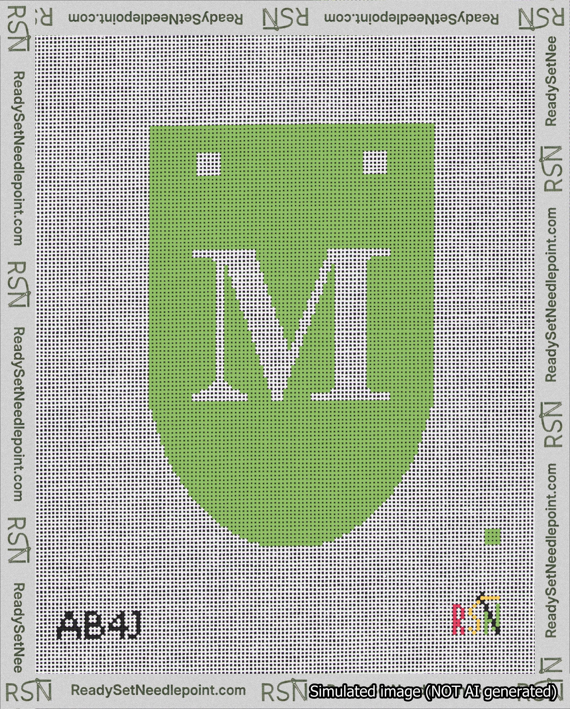 A taped needlepoint canvas with the design: Banner 18 mesh count Rounded M White on Light Green.