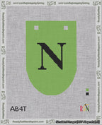 A taped needlepoint canvas with the design: Banner 18 mesh count Rounded N Black on Light Green.