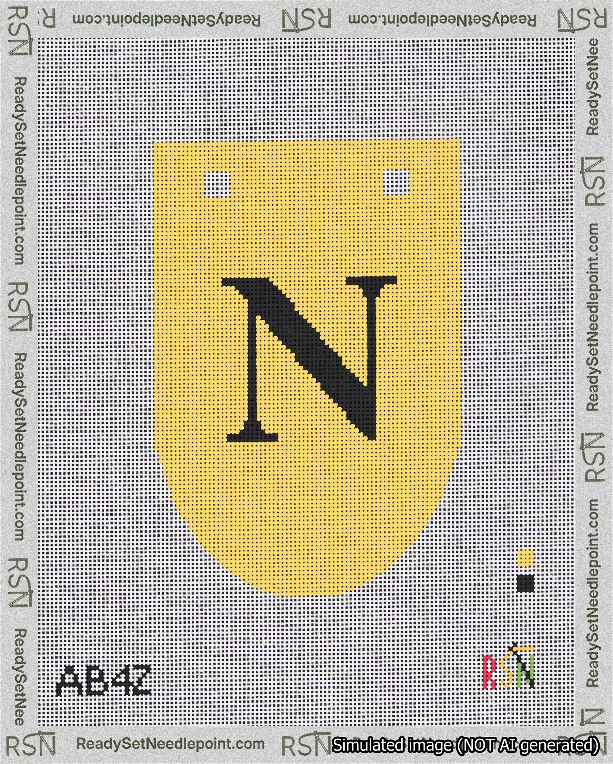 A taped needlepoint canvas with the design: Banner 18 mesh count Rounded N Black on Yellow.