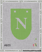 A taped needlepoint canvas with the design: Banner 18 mesh count Rounded N White on Light Green.