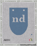 A taped needlepoint canvas with the design: Banner 18 mesh count Rounded nd White on Blue.