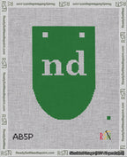 A taped needlepoint canvas with the design: Banner 18 mesh count Rounded nd White on Green.