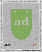A taped needlepoint canvas with the design: Banner 18 mesh count Rounded nd White on Light Green.