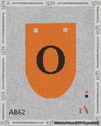 A taped needlepoint canvas with the design: Banner 18 mesh count Rounded O Black on Orange.