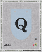 A taped needlepoint canvas with the design: Banner 18 mesh count Rounded Q Black on Light Blue.