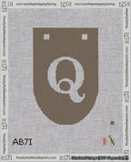A taped needlepoint canvas with the design: Banner 18 mesh count Rounded Q White on Brown.