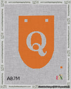 A taped needlepoint canvas with the design: Banner 18 mesh count Rounded Q White on Orange.