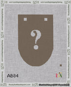 A taped needlepoint canvas with the design: Banner 18 mesh count Rounded Question White on Brown.
