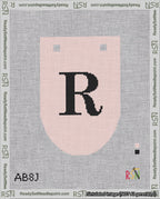 A taped needlepoint canvas with the design: Banner 18 mesh count Rounded R Black on Pink.