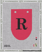 A taped needlepoint canvas with the design: Banner 18 mesh count Rounded R Black on Red.