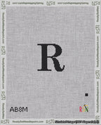 A taped needlepoint canvas with the design: Banner 18 mesh count Rounded R Black on White.