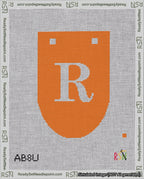 A taped needlepoint canvas with the design: Banner 18 mesh count Rounded R White on Orange.