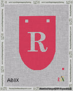 A taped needlepoint canvas with the design: Banner 18 mesh count Rounded R White on Red.