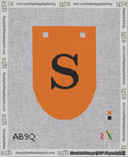 A taped needlepoint canvas with the design: Banner 18 mesh count Rounded S Black on Orange.