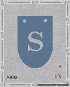 A taped needlepoint canvas with the design: Banner 18 mesh count Rounded S White on Blue.