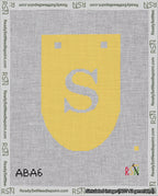 A taped needlepoint canvas with the design: Banner 18 mesh count Rounded S White on Yellow.