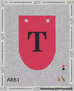 A taped needlepoint canvas with the design: Banner 18 mesh count Rounded T Black on Red.