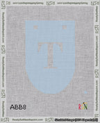 A taped needlepoint canvas with the design: Banner 18 mesh count Rounded T White on Light Blue.