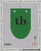 A taped needlepoint canvas with the design: Banner 18 mesh count Rounded th Black on Green.