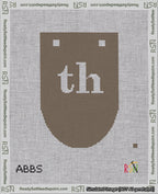 A taped needlepoint canvas with the design: Banner 18 mesh count Rounded th White on Brown.