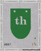 A taped needlepoint canvas with the design: Banner 18 mesh count Rounded th White on Green.