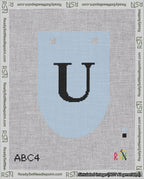 A taped needlepoint canvas with the design: Banner 18 mesh count Rounded U Black on Light Blue.