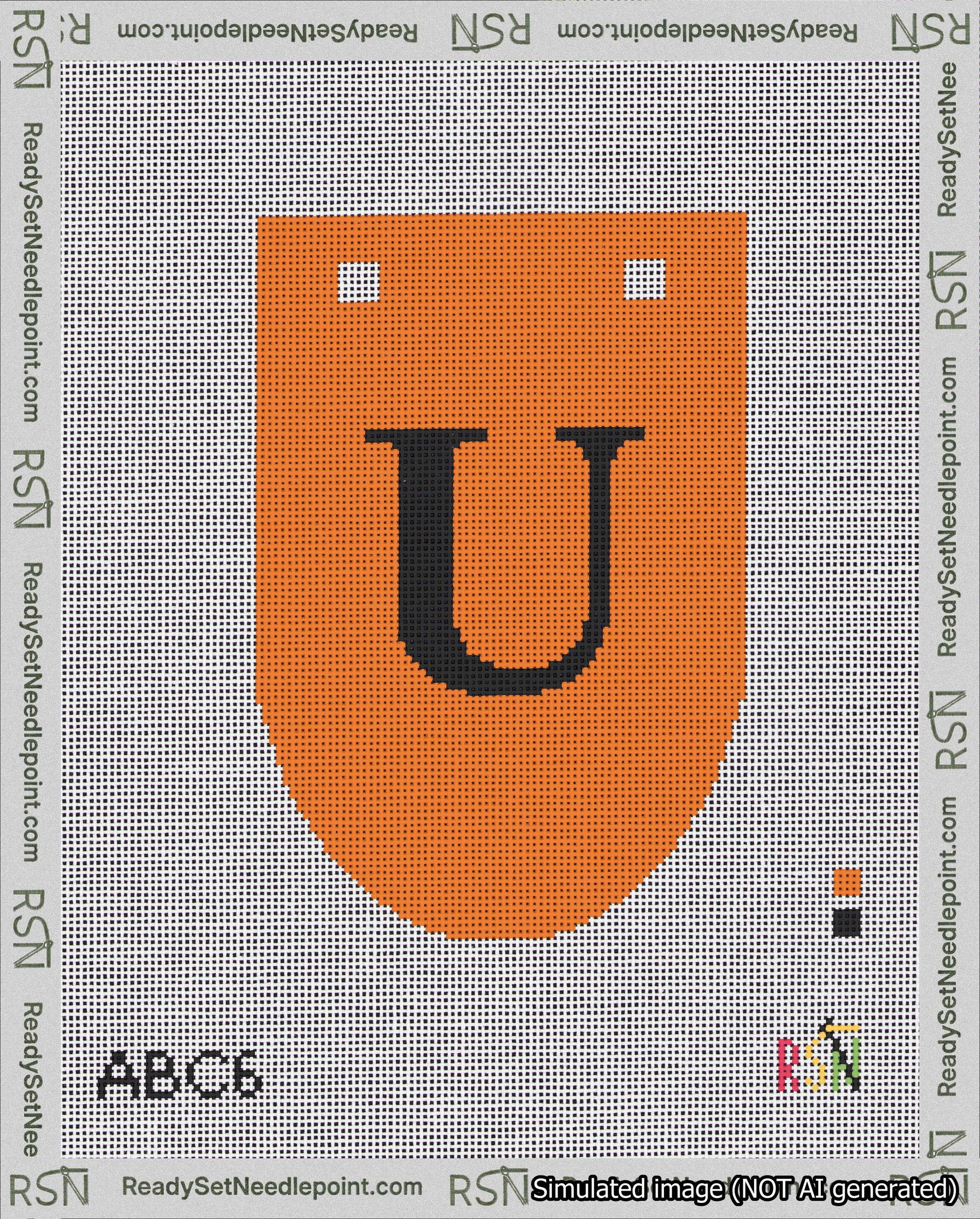 A taped needlepoint canvas with the design: Banner 18 mesh count Rounded U Black on Orange.