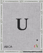 A taped needlepoint canvas with the design: Banner 18 mesh count Rounded U Black on White.