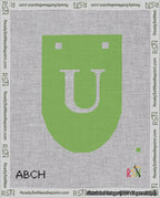 A taped needlepoint canvas with the design: Banner 18 mesh count Rounded U White on Light Green.