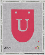 A taped needlepoint canvas with the design: Banner 18 mesh count Rounded U White on Red.