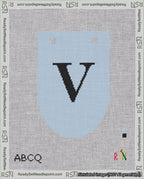 A taped needlepoint canvas with the design: Banner 18 mesh count Rounded V Black on Light Blue.