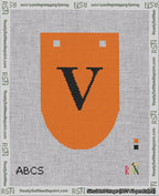 A taped needlepoint canvas with the design: Banner 18 mesh count Rounded V Black on Orange.