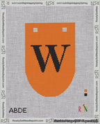 A taped needlepoint canvas with the design: Banner 18 mesh count Rounded W Black on Orange.